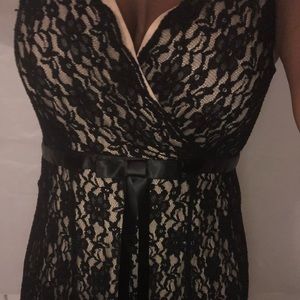 Sleeveless black and tan dress